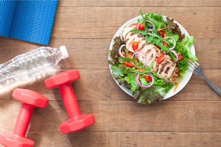 salad dumbells and water help in building healthy habits