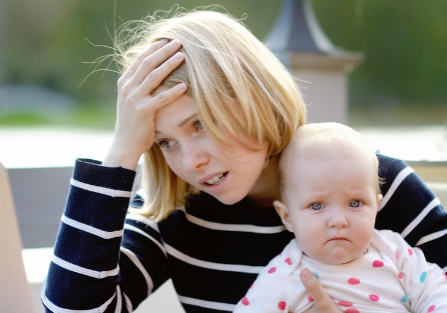 young mum looking stressed | what is postnatal depletion? | Perpetual Wellbeing